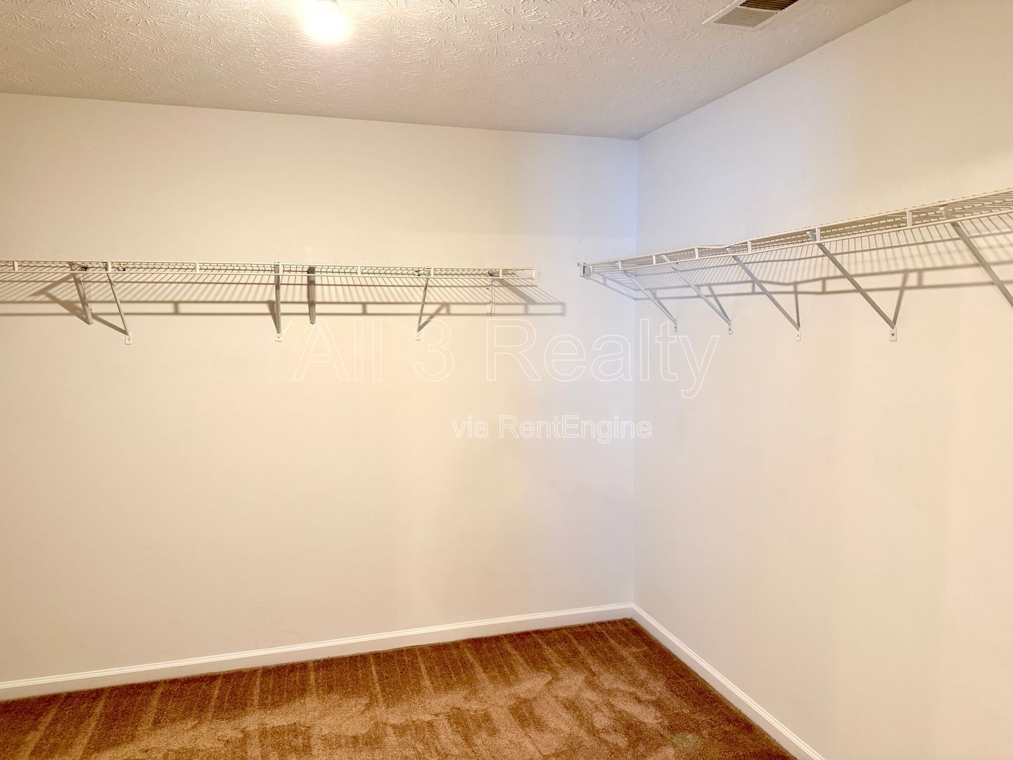 Charming 3-bedroom, 2.5-bath home in Lithonia, GA featuring a cozy fireplace and ceiling fans throughout. property image