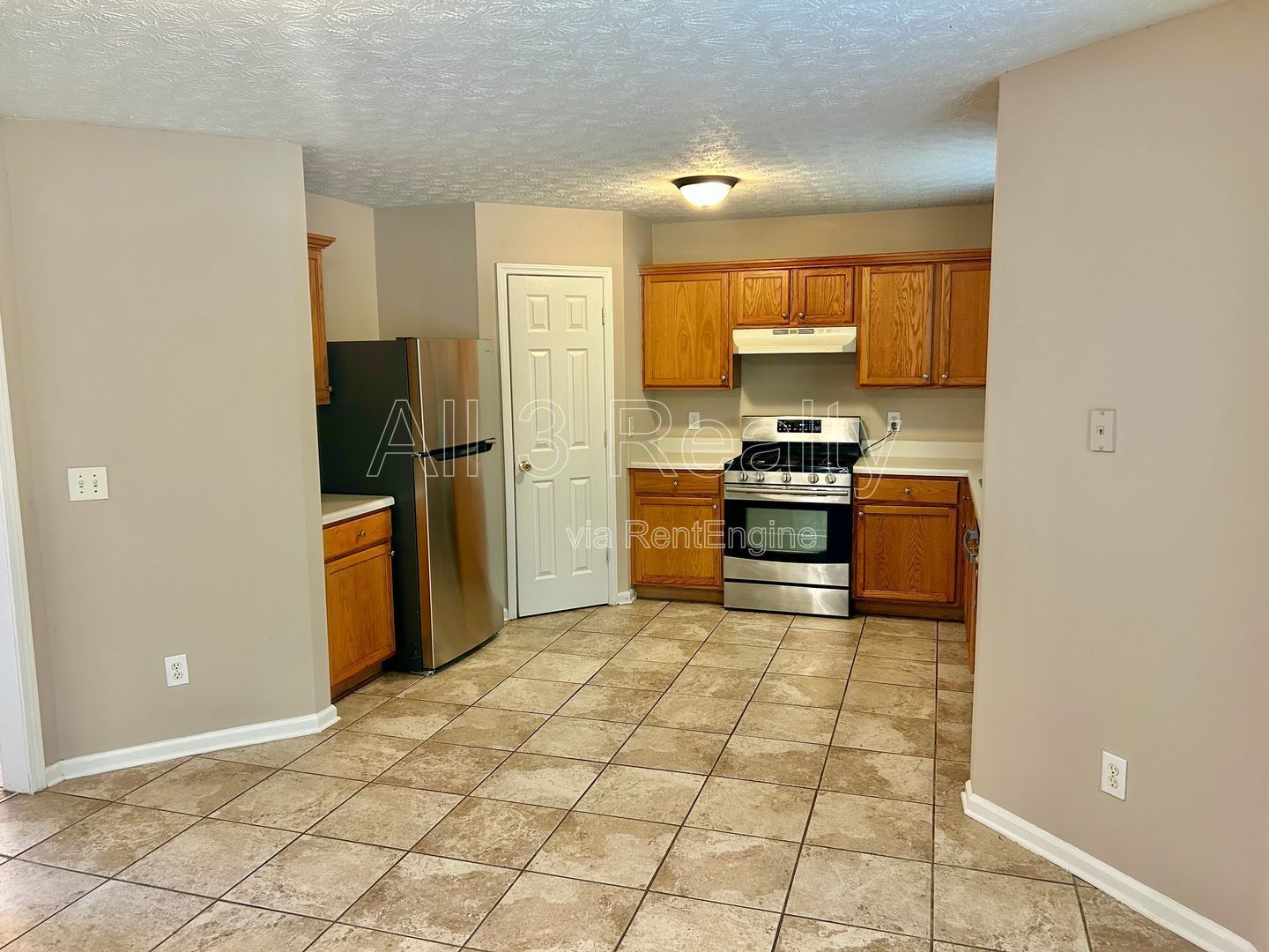Charming 3-bedroom, 2.5-bath home in Lithonia, GA featuring a cozy fireplace and ceiling fans throughout. property image