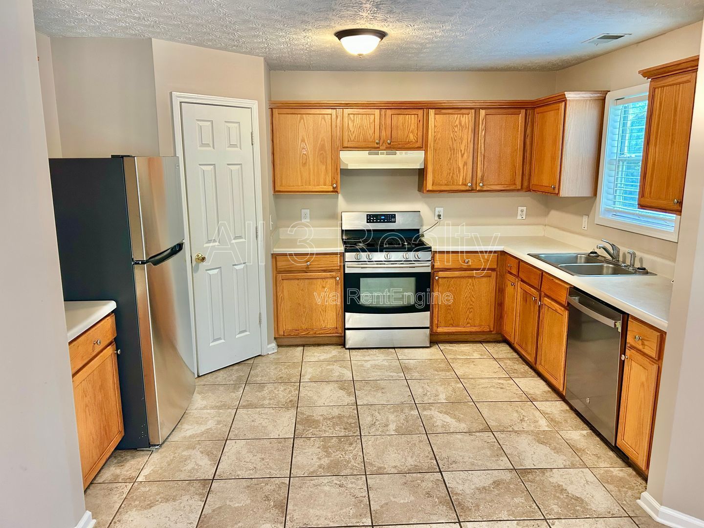 Charming 3-bedroom, 2.5-bath home in Lithonia, GA featuring a cozy fireplace and ceiling fans throughout. property image