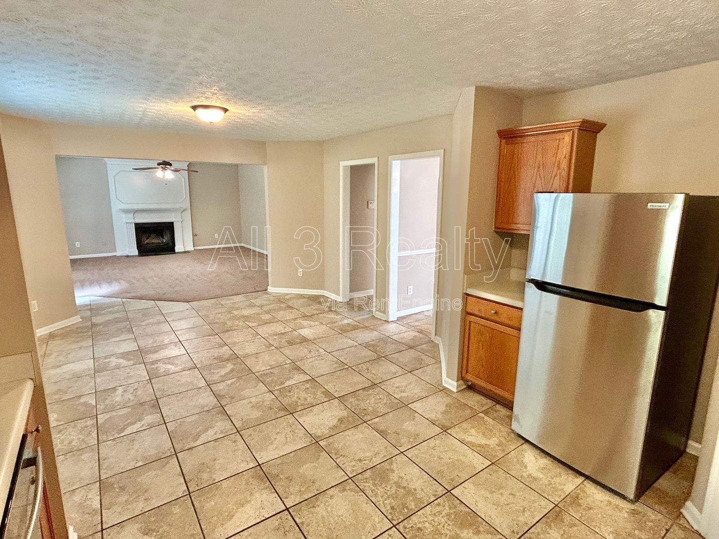 Charming 3-bedroom, 2.5-bath home in Lithonia, GA featuring a cozy fireplace and ceiling fans throughout. property image