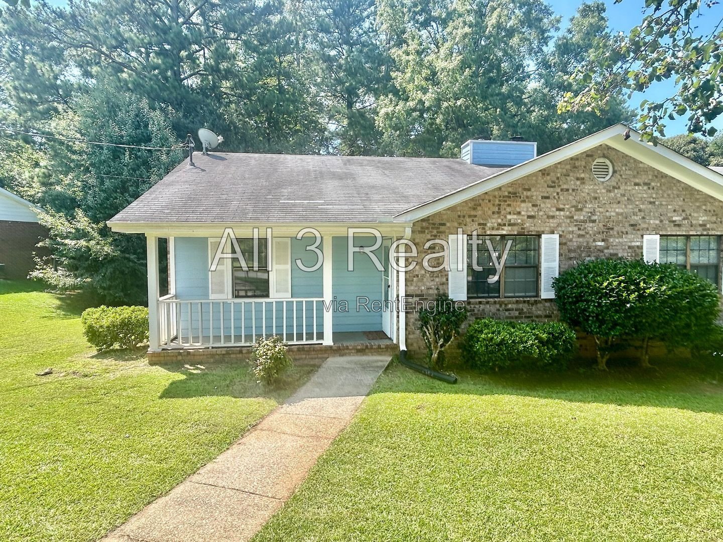 Charming 2-bedroom, 1.5-bath home in Jonesboro, GA featuring a cozy fireplace and a well-equipped kitchen with ample cabinet storage. property image