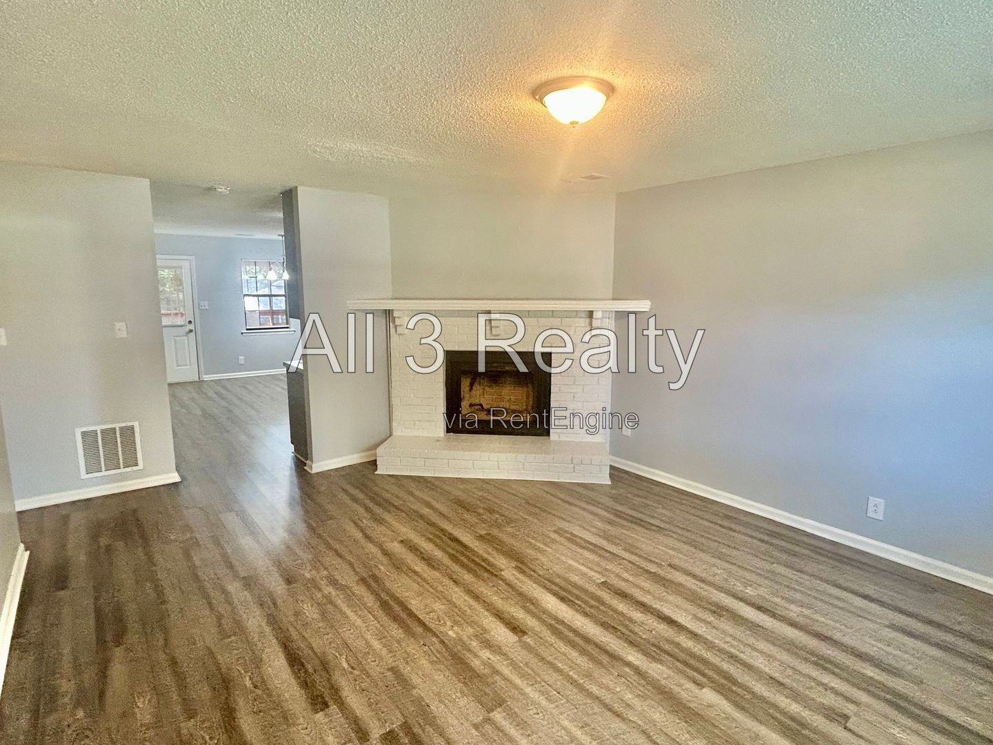 Charming 2-bedroom, 1.5-bath home in Jonesboro, GA featuring a cozy fireplace and a well-equipped kitchen with ample cabinet storage. property image