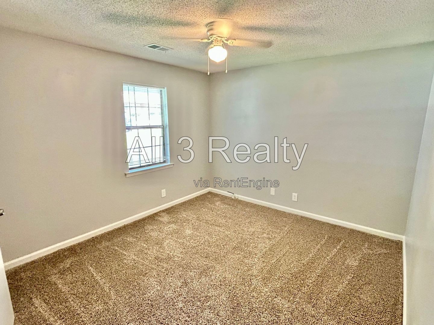 Charming 2-bedroom, 1.5-bath home in Jonesboro, GA featuring a cozy fireplace and a well-equipped kitchen with ample cabinet storage. property image