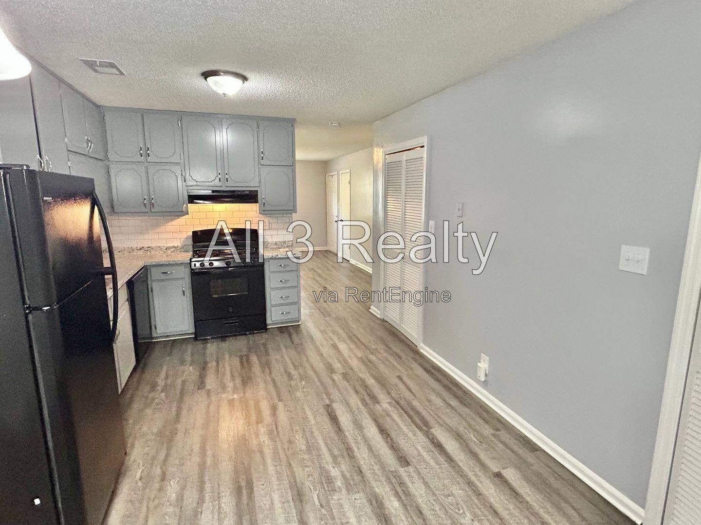 Charming 2-bedroom, 1.5-bath home in Jonesboro, GA featuring a cozy fireplace and a well-equipped kitchen with ample cabinet storage. property image