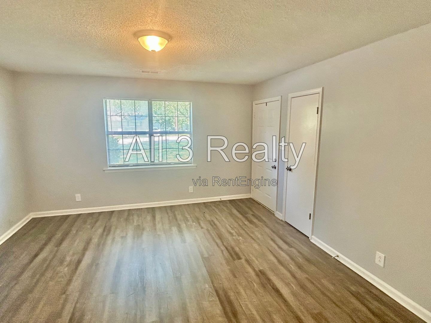 Charming 2-bedroom, 1.5-bath home in Jonesboro, GA featuring a cozy fireplace and a well-equipped kitchen with ample cabinet storage. property image