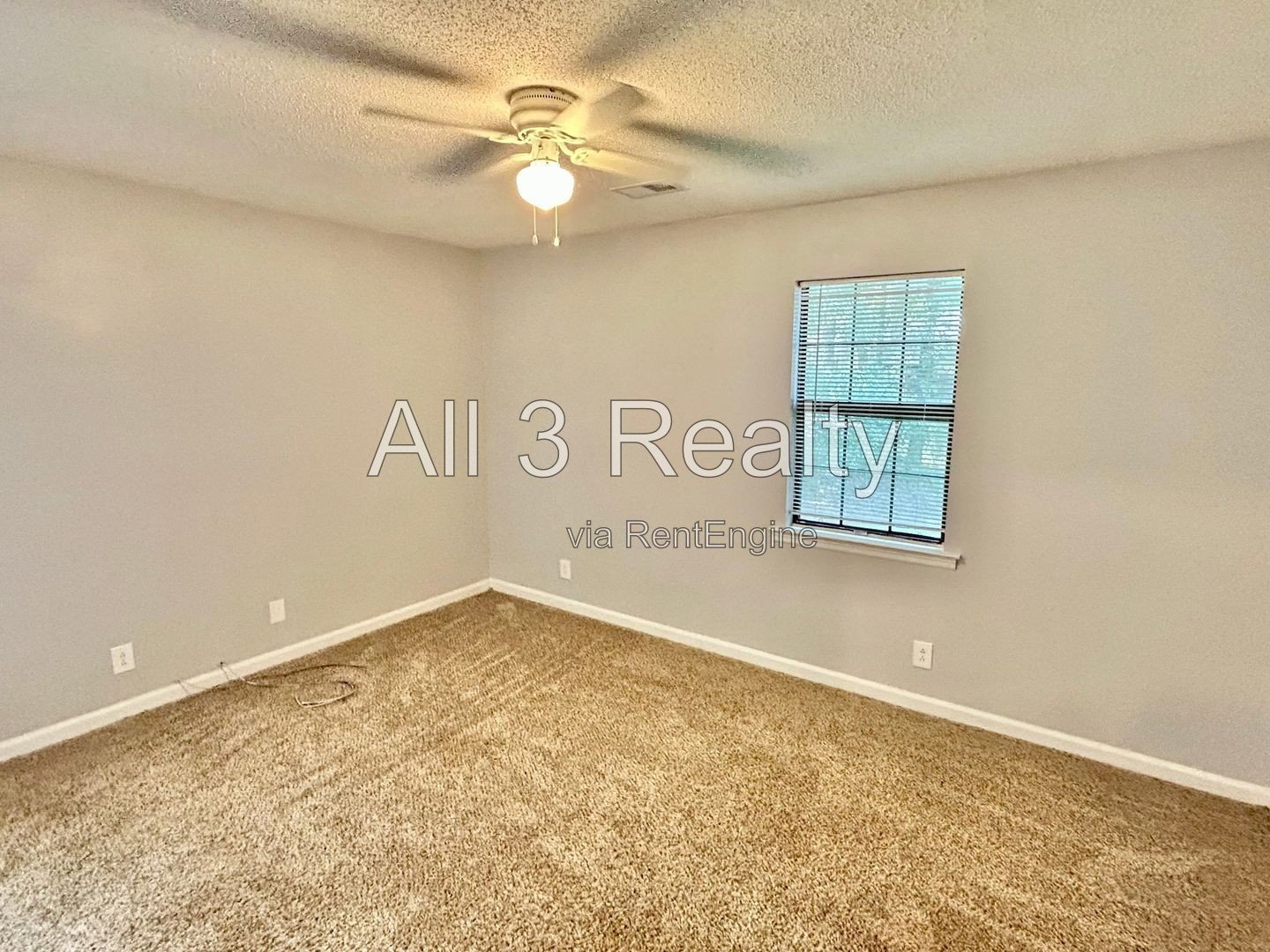Charming 2-bedroom, 1.5-bath home in Jonesboro, GA featuring a cozy fireplace and a well-equipped kitchen with ample cabinet storage. property image