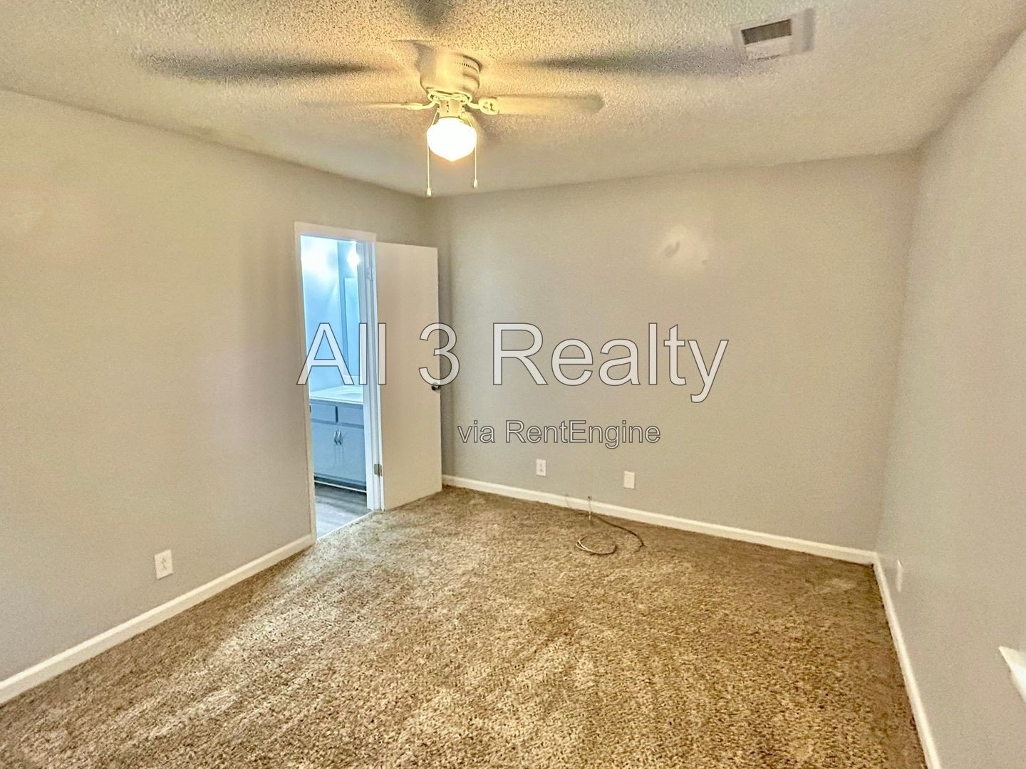 Charming 2-bedroom, 1.5-bath home in Jonesboro, GA featuring a cozy fireplace and a well-equipped kitchen with ample cabinet storage. property image