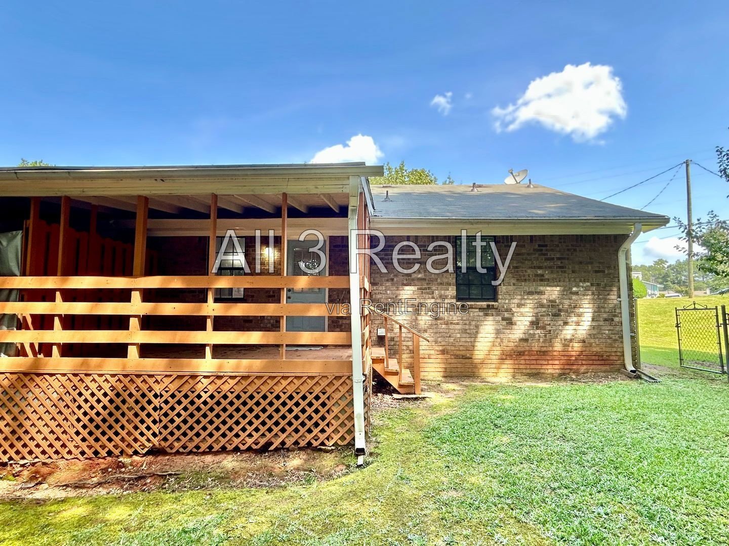 Charming 2-bedroom, 1.5-bath home in Jonesboro, GA featuring a cozy fireplace and a well-equipped kitchen with ample cabinet storage. property image