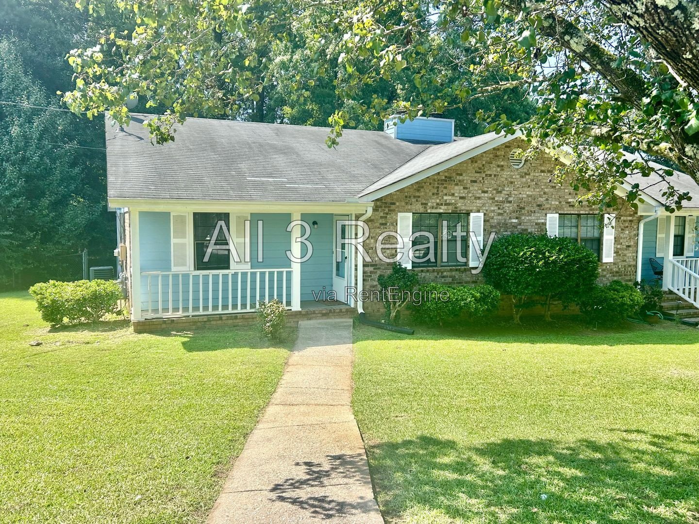 Charming 2-bedroom, 1.5-bath home in Jonesboro, GA featuring a cozy fireplace and a well-equipped kitchen with ample cabinet storage. property image