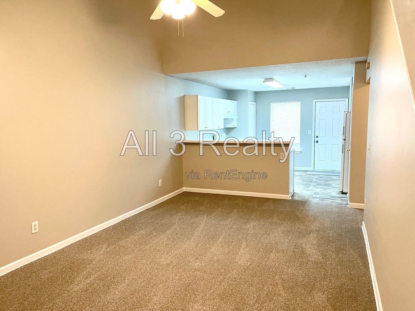 Charming 3-bedroom, 2.5-bath home in McDonough, GA featuring comfortable carpeted living spaces and ceiling fans throughout. property image