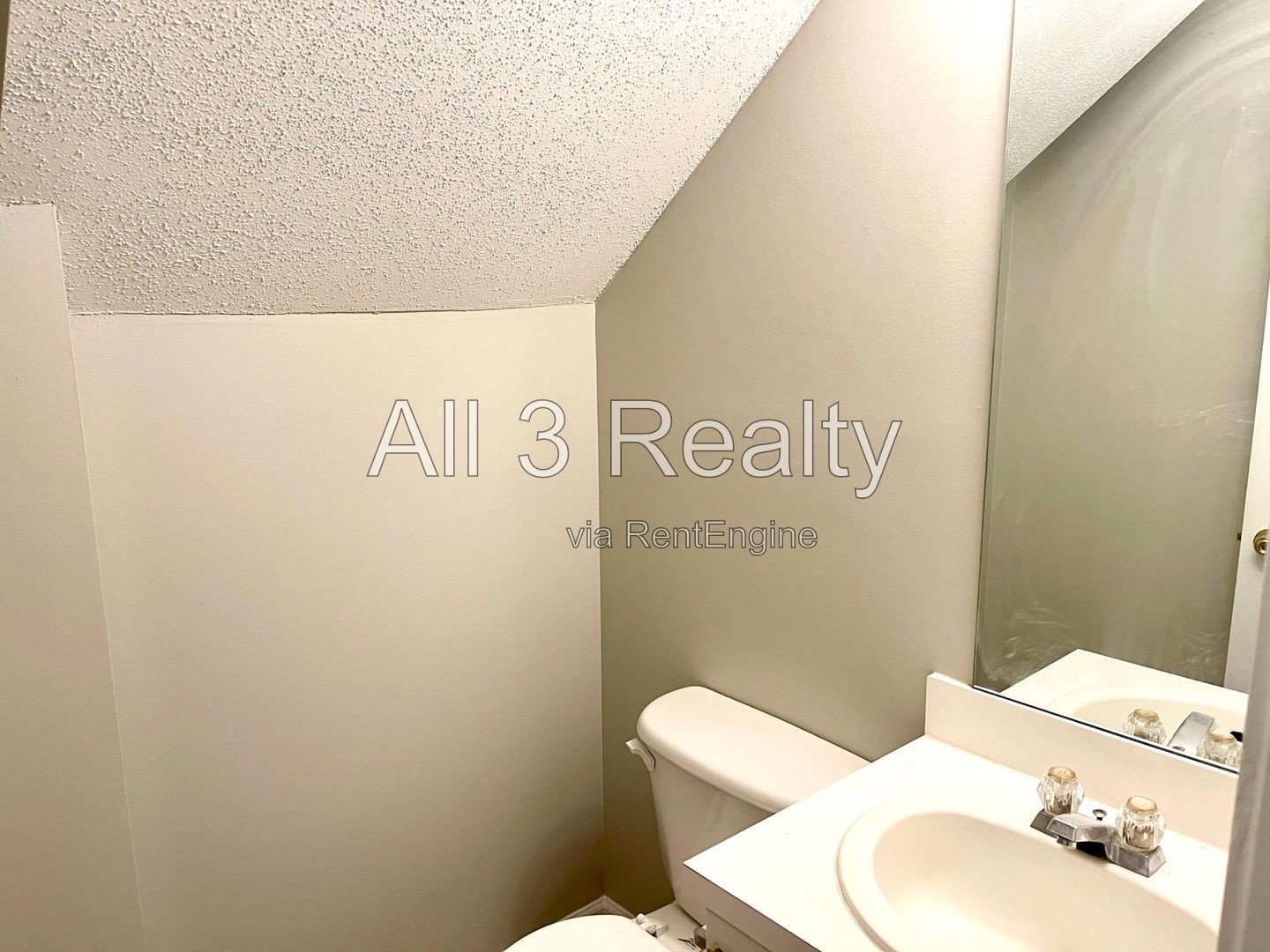 Charming 3-bedroom, 2.5-bath home in McDonough, GA featuring comfortable carpeted living spaces and ceiling fans throughout. property image