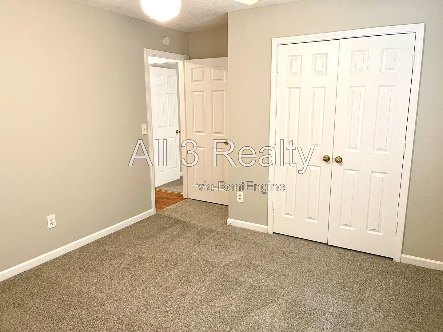 Charming 3-bedroom, 2.5-bath home in McDonough, GA featuring comfortable carpeted living spaces and ceiling fans throughout. property image