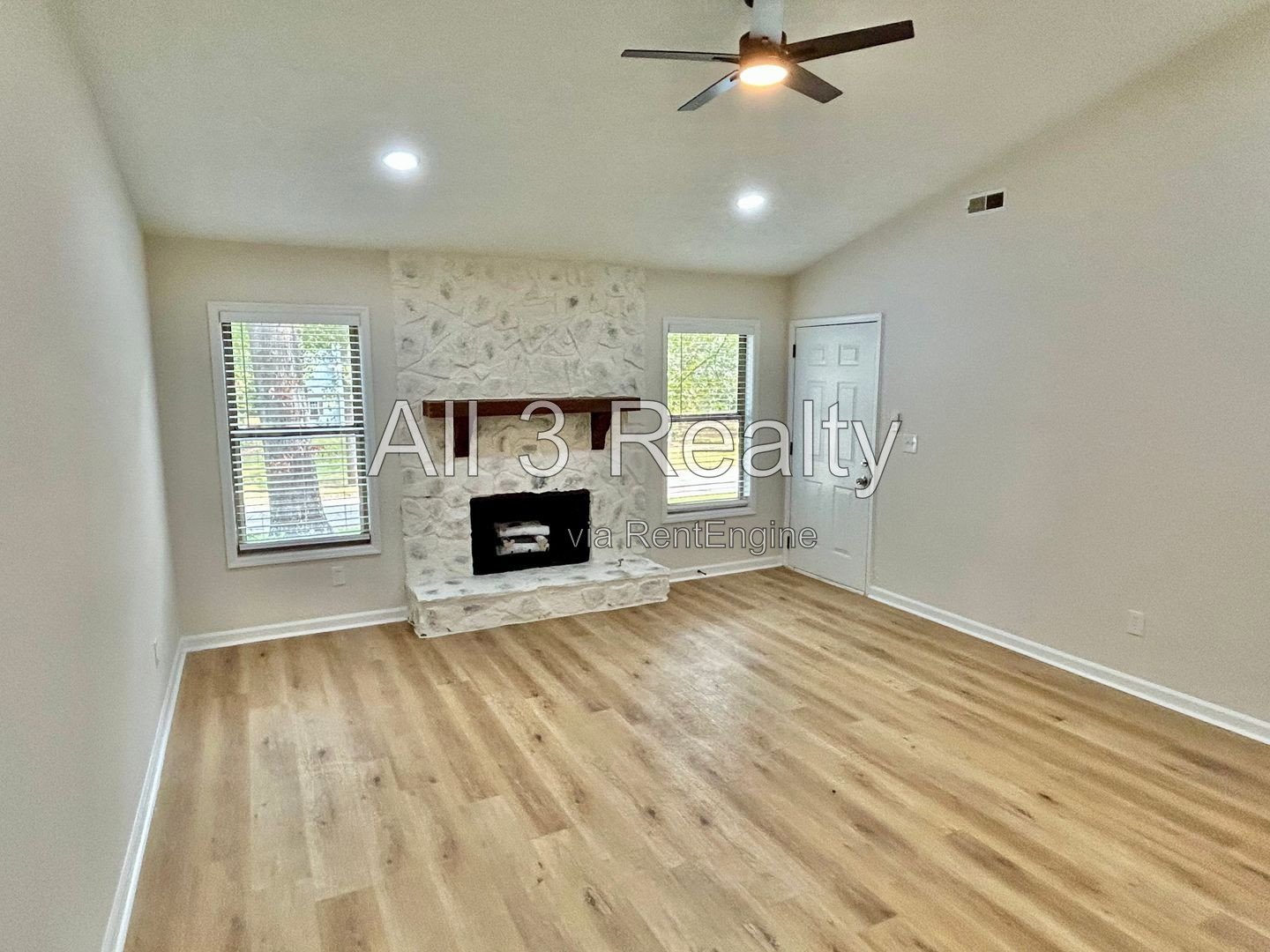 Discover this renovated 3-bedroom, 2-bath home in Fayetteville, GA. The interior features a cozy fireplace and ceiling fans throughout for added comfort. property image