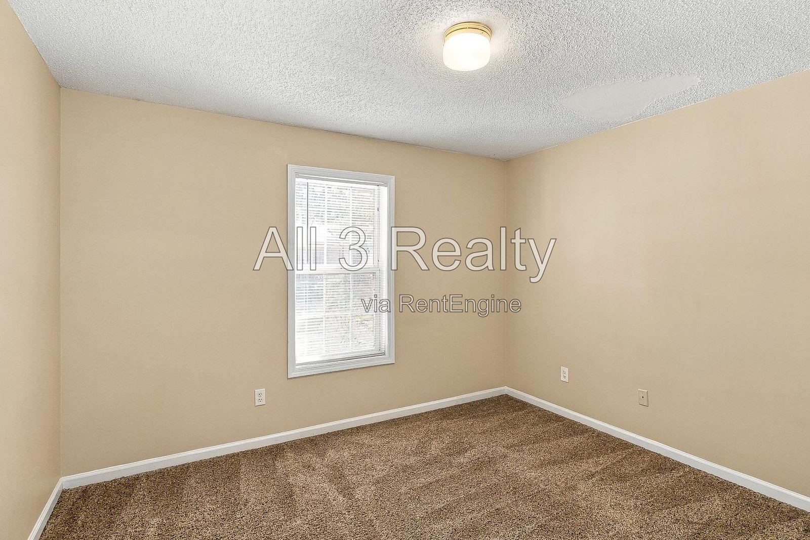 This two-story home in Jonesboro, GA offers four bedrooms and three bathrooms with high ceilings and abundant natural light throughout. property image