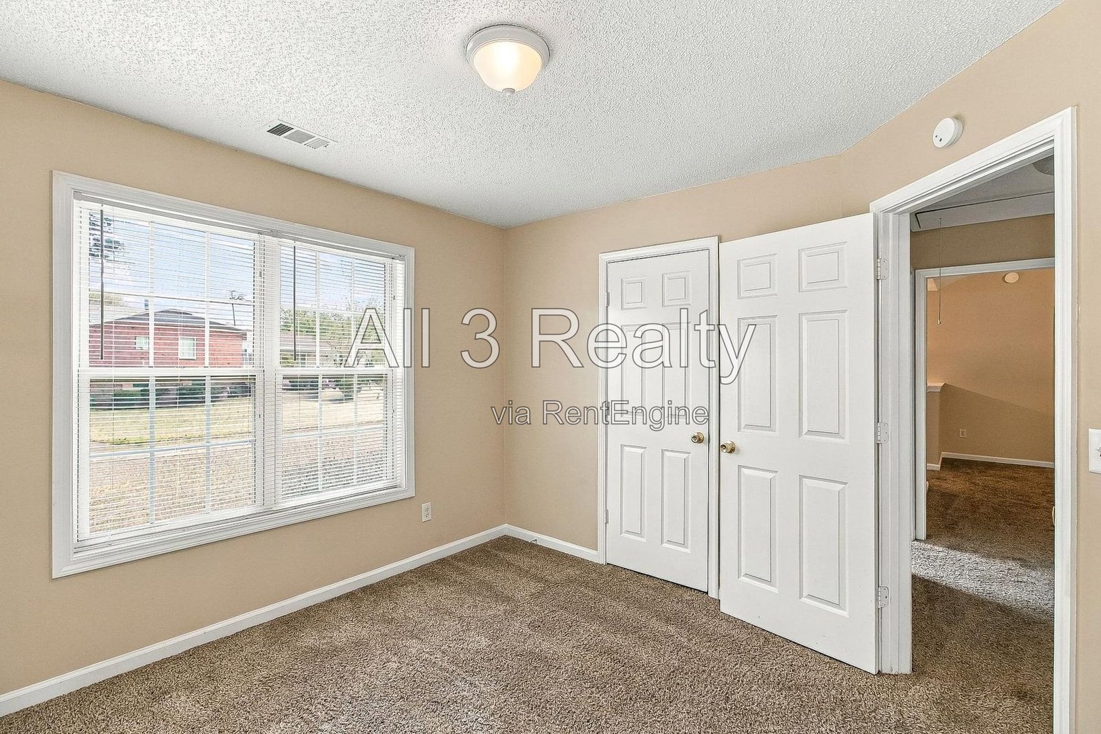 This two-story home in Jonesboro, GA offers four bedrooms and three bathrooms with high ceilings and abundant natural light throughout. property image