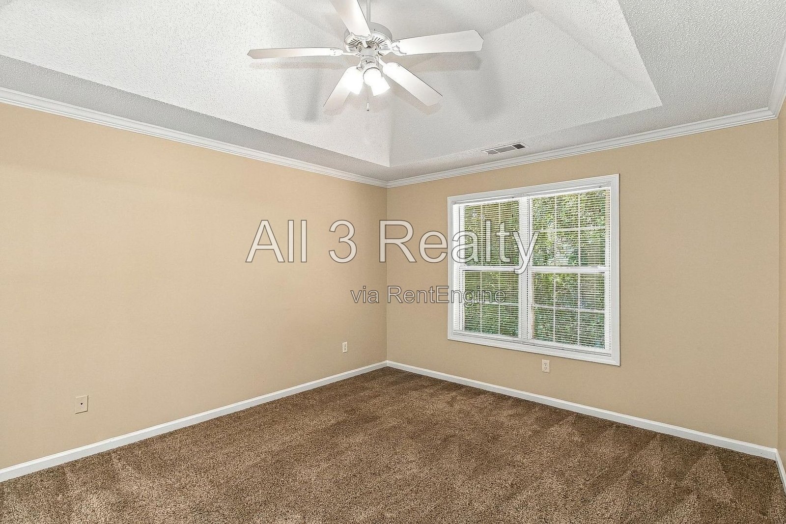 This two-story home in Jonesboro, GA offers four bedrooms and three bathrooms with high ceilings and abundant natural light throughout. property image